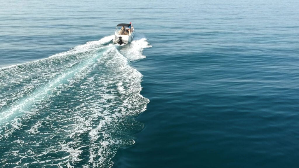 waves in the wake of our speedboat